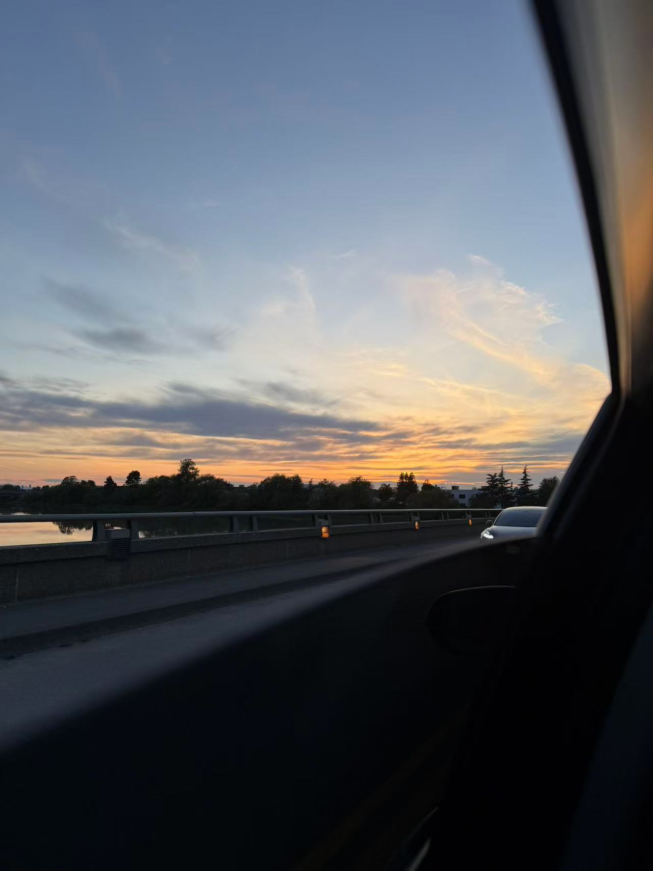 Vancouver sunset photographed through a car window